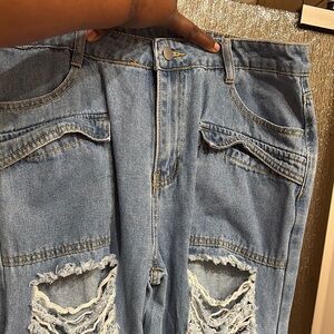 Distressed Blue Denim Jeans